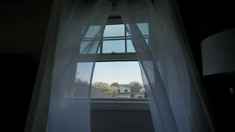 Transparent window curtain, slow moved by the wind. slow motion. Wide shot Stock Footage 240973095