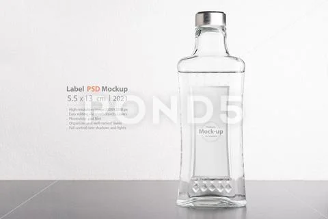 Transparent wine or water bottle in front of white background mock-up series PSD Template