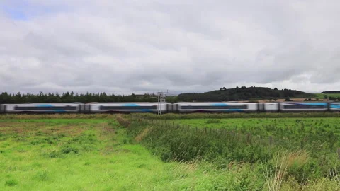 A TransPennine Express Train Heads Through Plumpton, Cumbria in Northern England Stock Footage 138734277