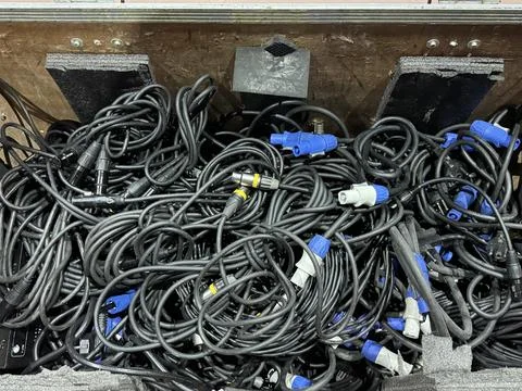 Transport container with cords, Flight case holding sound equipment and notes Stock Photos