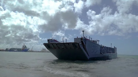 Transport loading ramp closing on U.S. Navy Landing Craft Utility Video stock 98289111