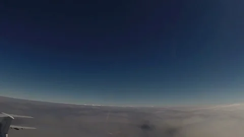 The transport plane flies above the clouds Stock Footage 84229953