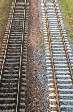 Transport safety concept. Two parallel railways. Vertical and horizontal. Stock Photos