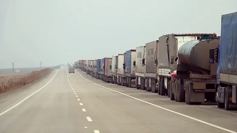 Transport Trucks Lined Up In Front Of The Border Stock-Footage 113867435