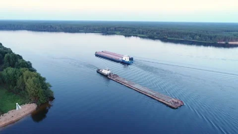 Transportation and delivery of general cargo and raw materials by water. Stock Footage 235570019