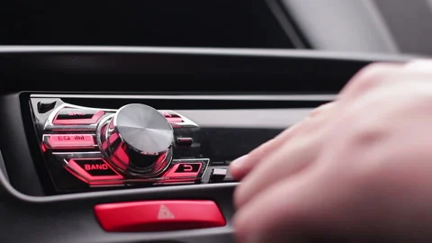 Transportation and vehicle concept - man using car audio stereo system Stock Footage 104368416