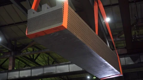 Transportation on cables of concrete structures at the electrode plant. Close up Stock Footage 116229813