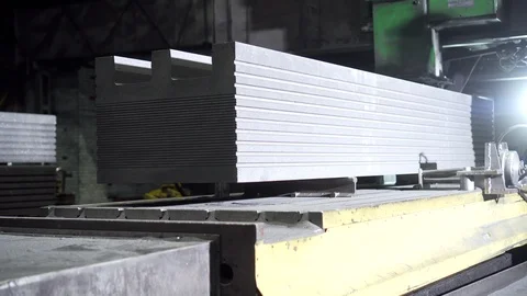 Transportation of concrete structures at the electrode plant. Warehouse factory. Stock Footage 116229803