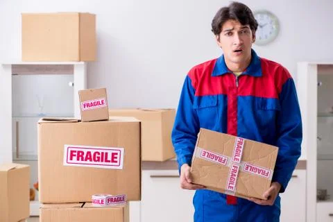 Transportation contractor with fragile boxes Stock Photos