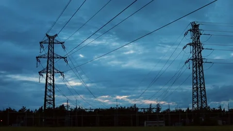 Transportation of electricity to users. Electrification of the population. Video stock 133916268