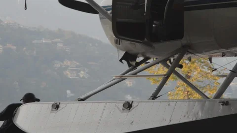 Transportation of the floatplane in lake como by a man Video stock 127823780