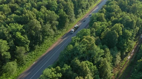 Transportation of large-sized construction equipment by a transport company Stock Footage 157997907