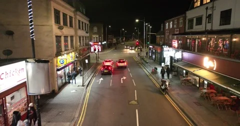 Transportation on track between restaurant and shops on night time Stock Footage 170963846