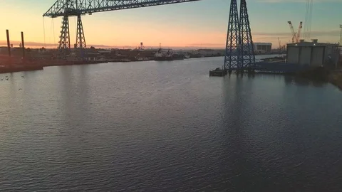 Transporter Bridge during Sunset with Flying Birds Stock Footage 111971385