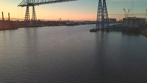 Transporter Bridge during Sunset with Flying Birds Stock Footage 111971513