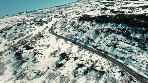 Transporting in the middle of a snowy road, a pickup truck Stock Footage 237157243