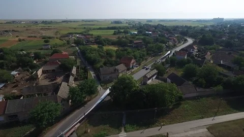 Transporting windmill propeller through the town, drone aerial footage Stock Footage 85232092
