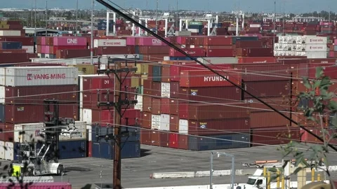 Transshipping cargo at container port  Stock Footage 211805241