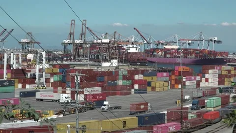 Transshipping cargo at container port  Video stock 211805254