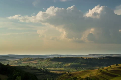 Transylvania hills patchwork fields cummulus 6K Stock Footage 40431658