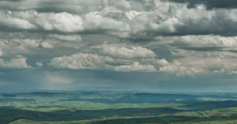 Transylvania Patchwork landscape rain storm in distance aerial tracking cinem Video stock 37284701