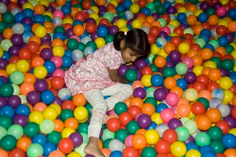 Trapped in Bed of Balls Stock Photos