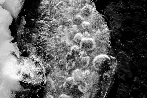 Trapped bubbles in ice Stock Photos