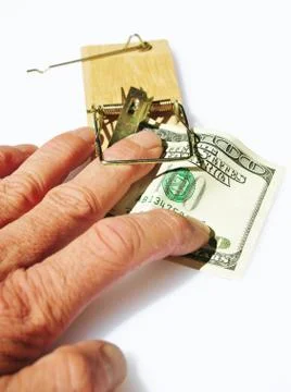 Trapped by greed Stock Photos