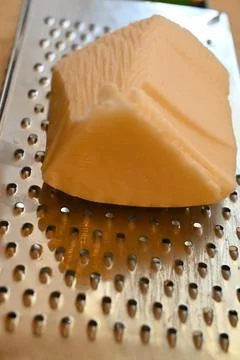 Trappist cheese on a grater Stock Photos