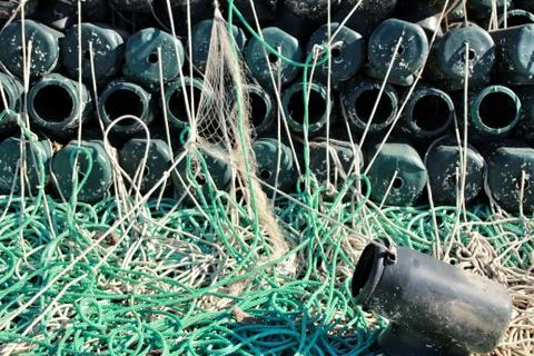 Traps to fish octopus and nets in the pier of Santa Pola Stock Photos