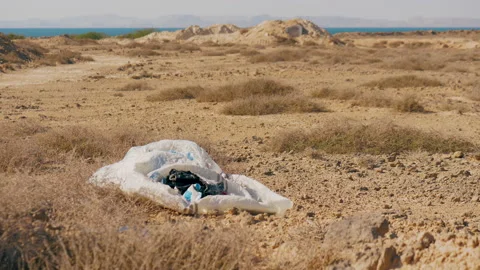 Trash abandoned in remote Island, plastic pollution and environment pollution Stock Footage 172044520