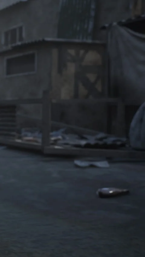 Trash and debris scattered on the ground near a dirty wall in an empty space Stock Footage 341051738