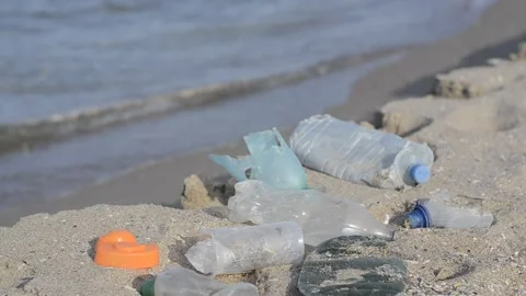 Trash and polution on the beach Stock Footage 200842805