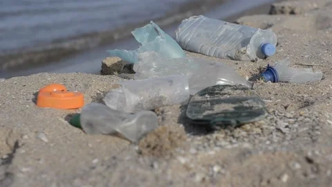 Trash and polution on the beach Stock Footage 200842814