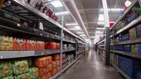 Trash and waste in the floor trip hazards Walmart retail store interior Stock Footage 157931353