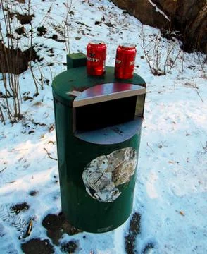 Trash around the can Stock Photos