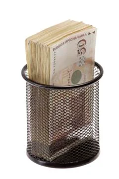 Trash with banknotes as metaphor Stock Photos