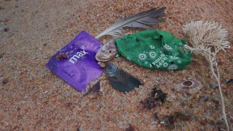 Trash on the beach 3 Stock Footage 121610790