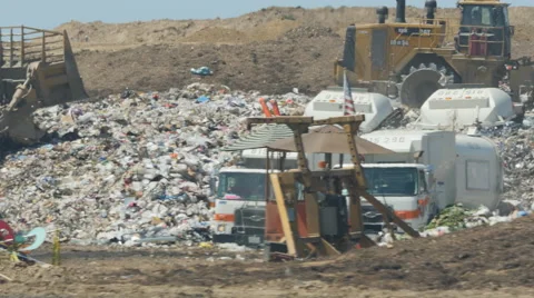 Trash being pushed around at the Dump Stock Footage 61768375