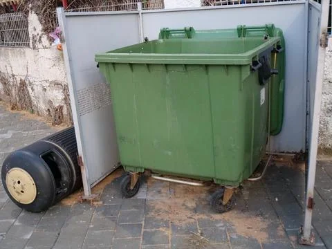 Trash Bin and Fallen Can 写真素材