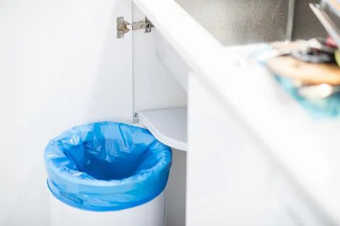 Trash bin in the kitchen Stock Photos