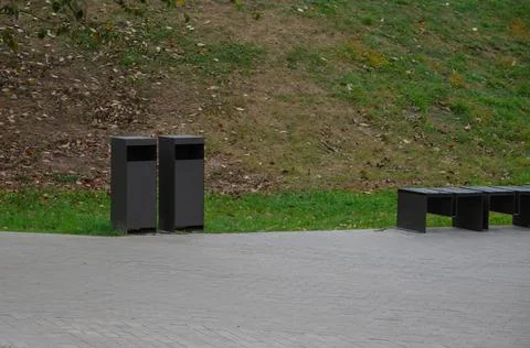 Trash bin in the park Stock Photos