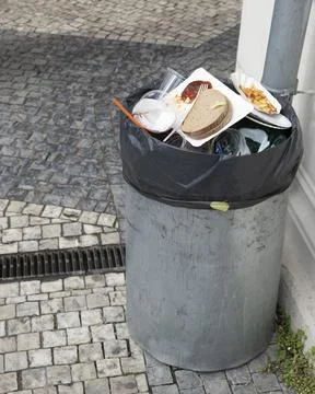 Trash bin on the street Stock Photos