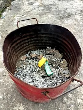 The trash burning drum. Stock Photos