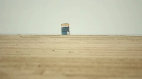 Trash Can on Beach Stock Footage 11442604