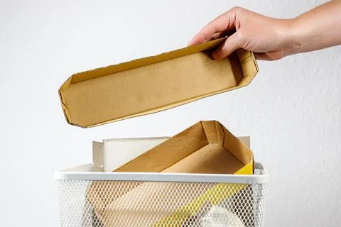 Trash can with cardboard. sorting trash. paper and cardboard. Stock-Fotos