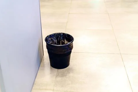 The trash can is on the floor Stock Photos