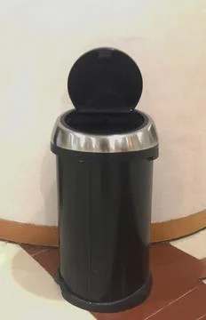 	The trash can is open and empty. Stock Photos