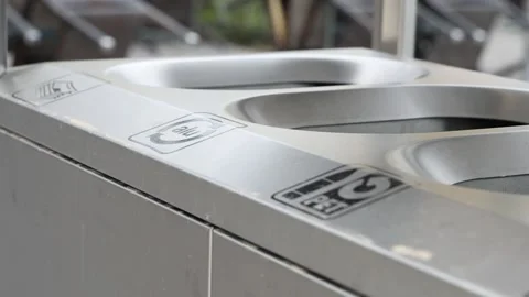 Trash can for recyclable PET plastic bottles, aluminum and paper Stock Footage 270573459
