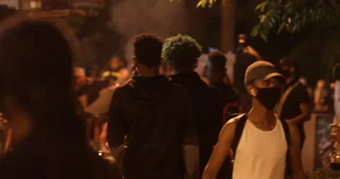 A trash can is set on fire at a Black Lives Matter protest in Washington, DC Stock Footage 131486331